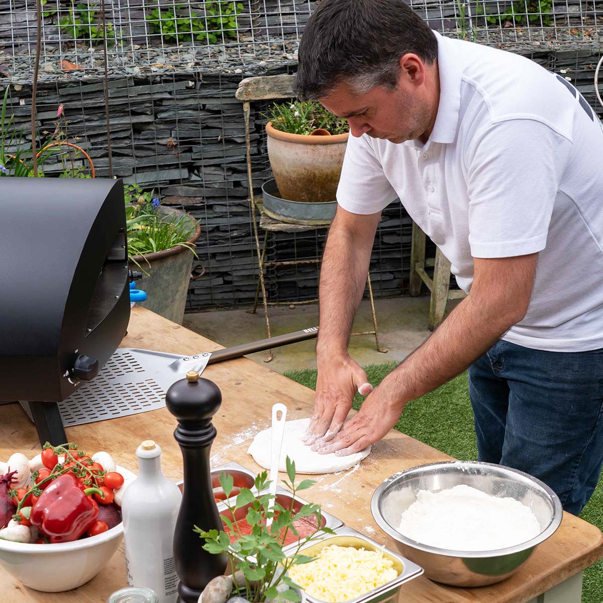 Pizza cooking in Omica Pizza oven image